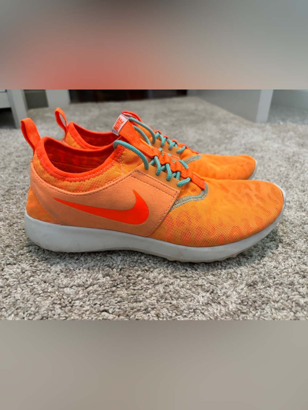 Nike Bright Orange Trainers with Teal Accent Laces
